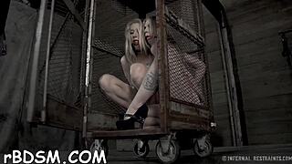 Tied up with bound tits getting toy action in this bondage fetish scene.