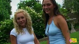 Big nipples harden fast! Lesbian pinches them outdoors leading to gaping orgasm.