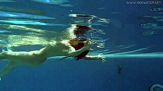 watch lina mercury in red lingerie underwater showing her big tits and tight pussy in the pool