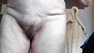 Grandma stuffs hairy pussy with cucumber in homemade fun