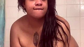 Fresh face teases with dildo in steamy shower solo fuck session