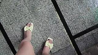 shemale ting xuan walks and relieves herself outdoors in public