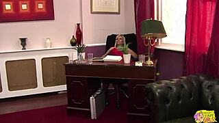 Boss lady masturbates alone in office until brunette secretary joins to help.