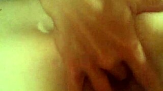 Descriptive scene of milf's intense masturbation leading to cumshot explosion inside her.