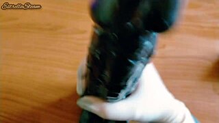 i love how i jerk off this big black dildo wearing my gloves carefully