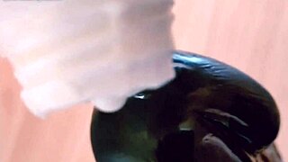 i love how i jerk off this big black dildo wearing my gloves carefully