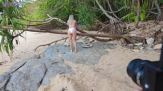Blonde milf cheats on husband with muscular photographer for risky outdoor blowjob and riding on beach.
