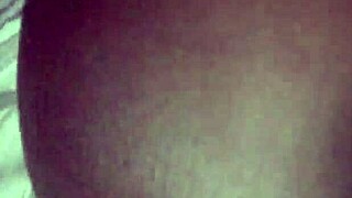 I'm a hot ebony girl teasing my tits while masturbating wildly