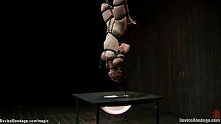 Watch This Redhead Lesbian Slave In Latex Lingerie Get Bound And Whipped Hard In Bizarre BDSM Session!