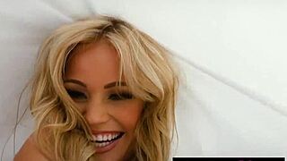 Elyse Jean seems like an innocent petite blonde babe at first. Then she flashes those sexy small tits in a teasing striptease.