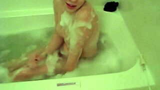 Tiny Red Slut with Sexy Body Fingers Pussy in Bathtub Until Orgasm. She Loves Bathing and Masturbating with Natural Tits Exposed.