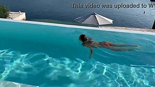 Gorgeous monika fox strips for naked swim in outdoor pool. Pierced nipples shine on big fake tits in public.