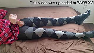 Shemale in plaid dress and argyle tights masturbates solo with fetish crossdressing