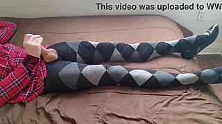 Shemale in plaid dress and argyle tights masturbates solo with fetish crossdressing