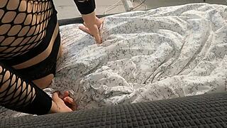 check out this sexy babe with big boobs getting all oiled up in lingerie and skirt