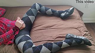 Shemale in plaid dress and argyle tights masturbates solo with fetish crossdressing