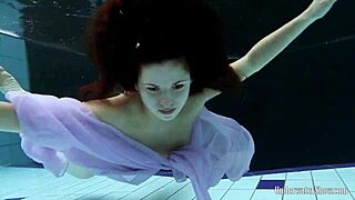 aneta shows off big tits in purple dress during pool time fun