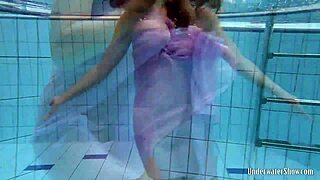 aneta shows off big tits in purple dress during pool time fun