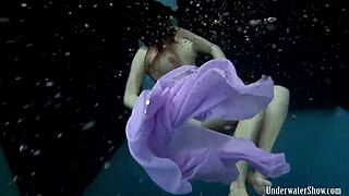 aneta shows off big tits in purple dress during pool time fun