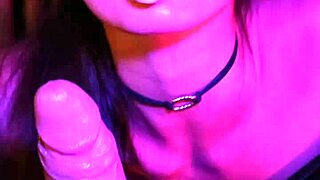 Petite brunette babe gives deepthroat blowjob with cum swallow in wet pov neon night