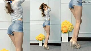 hey, check out this cute korean girl dancing so sexy and seductive with her big tits bouncing?
