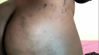 Pregnant ebony girlfriend rides dildo at home with big tits and ass, leading to creamy solo amateur action as curvy babe.