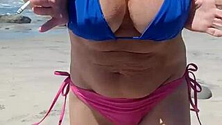 Milf goes fully nude while walking outdoors in public area.