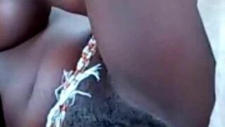 Shaved wet pussy lips spread in muscular slut video call