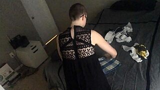 Bald girl starts folding laundry with KonMari method in clothed setting. She ignores voyeur while staying nude and hairless.