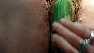 i can't get enough of granny's hairy pussy fucked by that huge cucumber