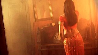 Look at this lovely brunette gracefully dancing and stripping off clothes in solo.