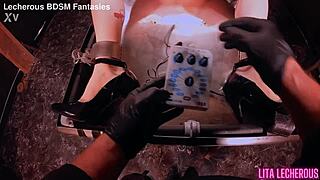 Strait jacket bound goth slut endured caning and pussy stapling in bdsm session