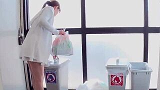 Neighbor housewife Mayumi Enokida goes braless for trash duty with shaved big tits in Japanese action.