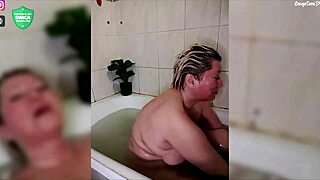 Aimee shaves her pussy then jerks off in steamy bathroom closeup