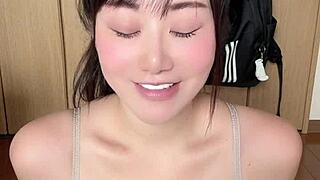 a naughty japanese girl bares her huge natural tits for you