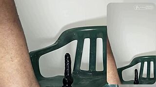Johnazino Rides Black Dildo Hard on Green Chair