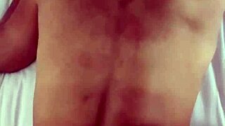 Boyfriend Whips Bound Girlfriend with Lash and Dildos on Beach