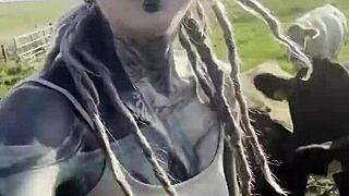 Just a tattooed happy hippy country girl chatting with cows and you too
