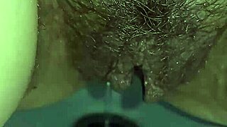 Mature brunette Gretala spreads her big hairy pussy wide