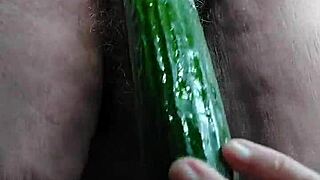 granny whore stuffs hairy beaver with fat cucumber