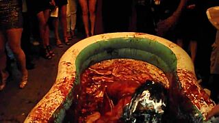 king cures chocolate babes wrestle naked in pool olympics