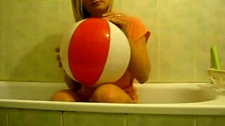 Sophie teases with balloons while masturbating in the living room and bathroom