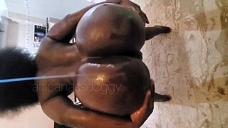 Oiled big ass ebony shakes bounces on huge bbc homemade