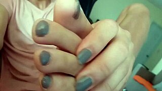 Shemale teases and plays sensually with her own feet fetish