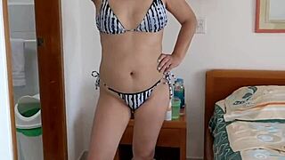 On the beach in bikini, my stepson jerks off staring at my big tits and ass