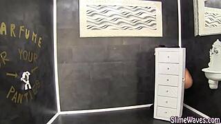 A fetish slut masturbates before bukkake facials in heels