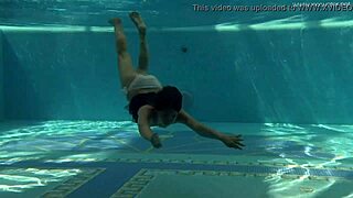 petite irina russaka swims underwater showing off her small tight tits