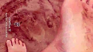 Bare feet sink into sand exploring every sensory texture and feel step by step