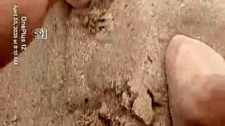 Bare feet sink into sand exploring every sensory texture and feel step by step