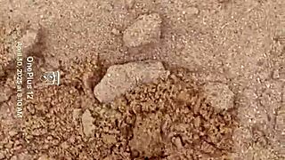 Bare feet sink into sand exploring every sensory texture and feel step by step